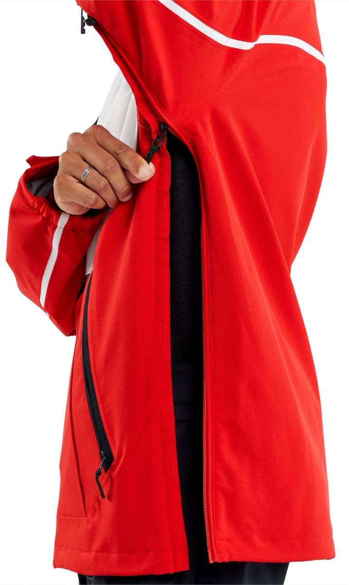 Volcom Brighton Pullover Jacket 2024 - A red jacket with a white stripe on the left sleeve and black zippers.