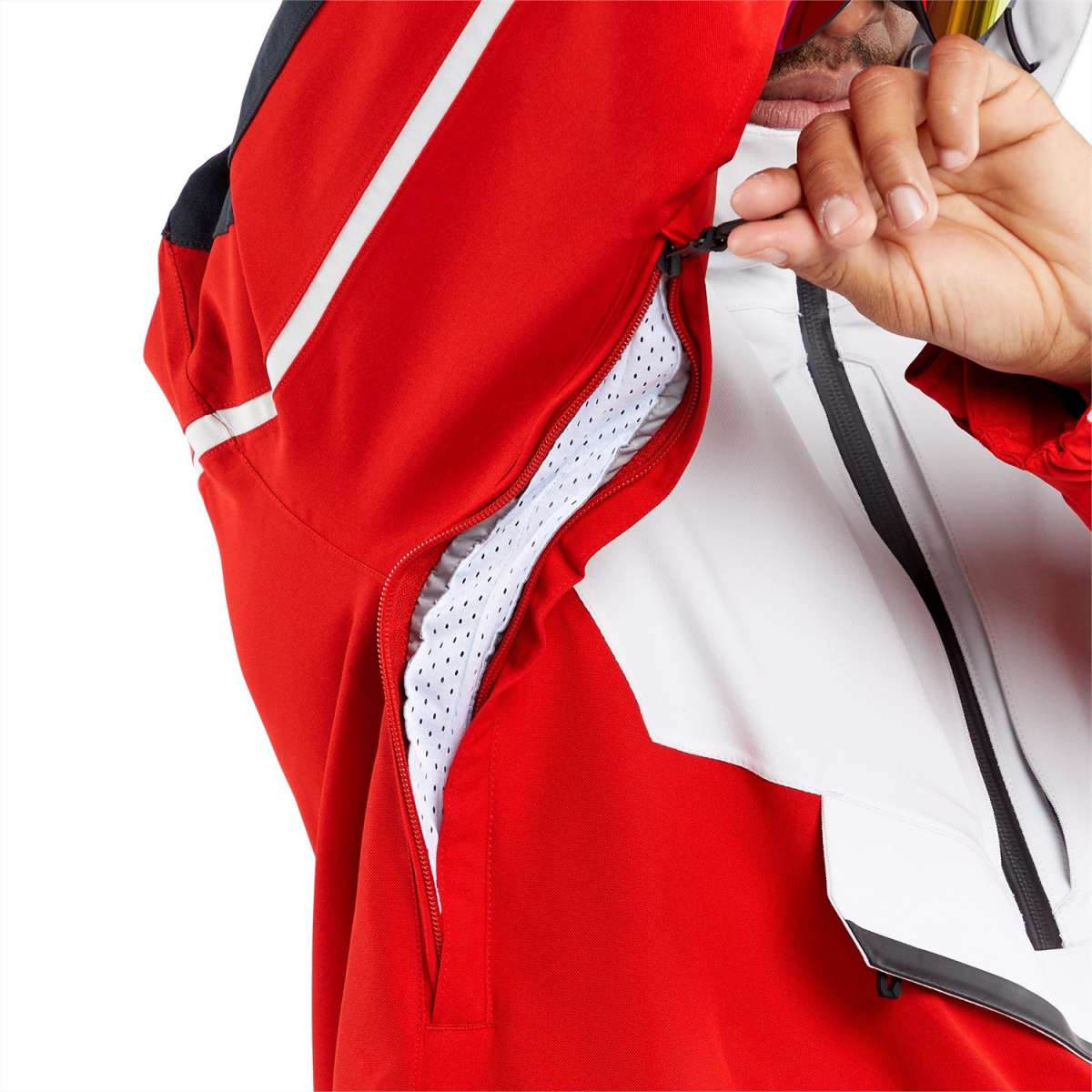 Volcom Brighton Pullover Jacket 2024 - A red, black, and white jacket with a zippered front and two pockets on either side.