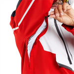 Volcom Brighton Pullover Jacket 2024 - A red, black, and white jacket with a zippered front and two pockets on either side.