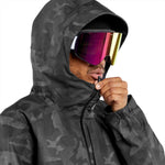 Volcom - A black jacket with a subtle gray camouflage pattern, featuring a hood and zippered pockets.