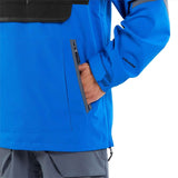 Volcom Brighton Pullover Jacket - A royal blue jacket with a black collar and gray accents on the shoulders, worn by a model from behind.