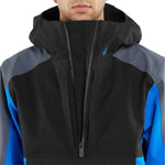 Volcom Brighton Pullover Jacket 2024 - A black jacket with a blue logo on the left chest and a zippered front.