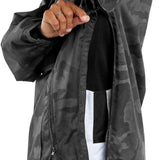 Volcom Brighton Pullover Jacket 2024 - A black jacket with a subtle gray camouflage pattern and a hood, featuring two zippered pockets on either side.