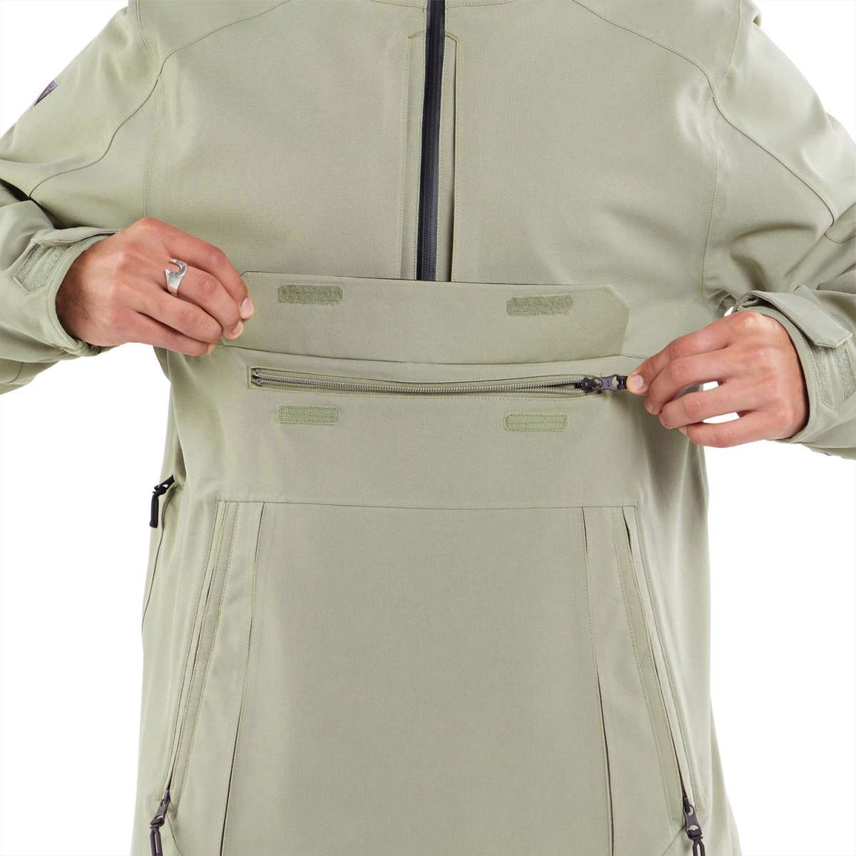 Volcom Brighton Pullover Jacket 2024 - A sage green jacket with a zippered chest pocket and adjustable cuffs.