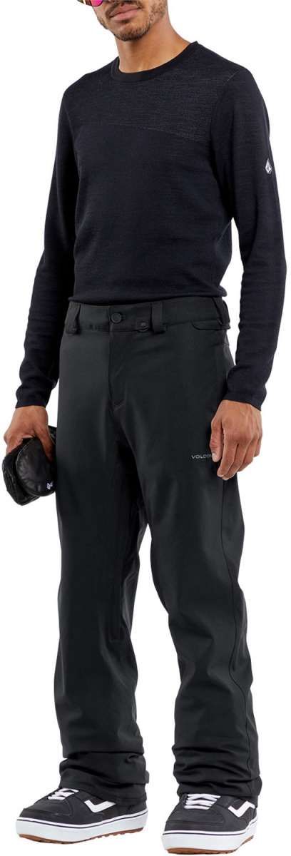 Volcom Freakin' Snow Chino Pants 2024 - Black pants with white stitching and a small logo on the left thigh.