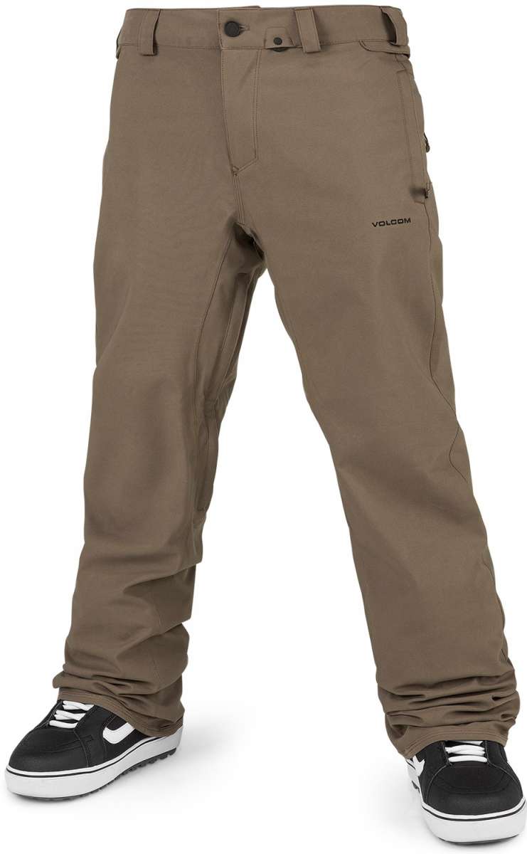 Volcom Freakin' Snow Chino Pants 2024 - Pair of khaki-colored snow pants with zippered pockets and a black logo on the left thigh.