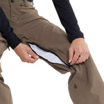 Volcom Freakin' Snow Chino Pants 2024 - Khaki pants with a zippered fly and black drawstring waistband.