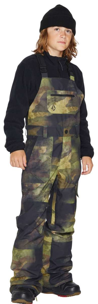 Volcom Juniors Barkley Bib Overall - A pair of camouflage-printed bib overalls with a black zipper and adjustable straps.
