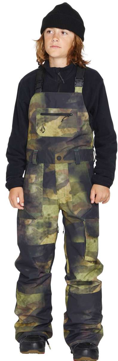 Volcom Juniors Barkley Bib Overall - A pair of camouflage-printed bib overalls with adjustable straps and a front pocket.