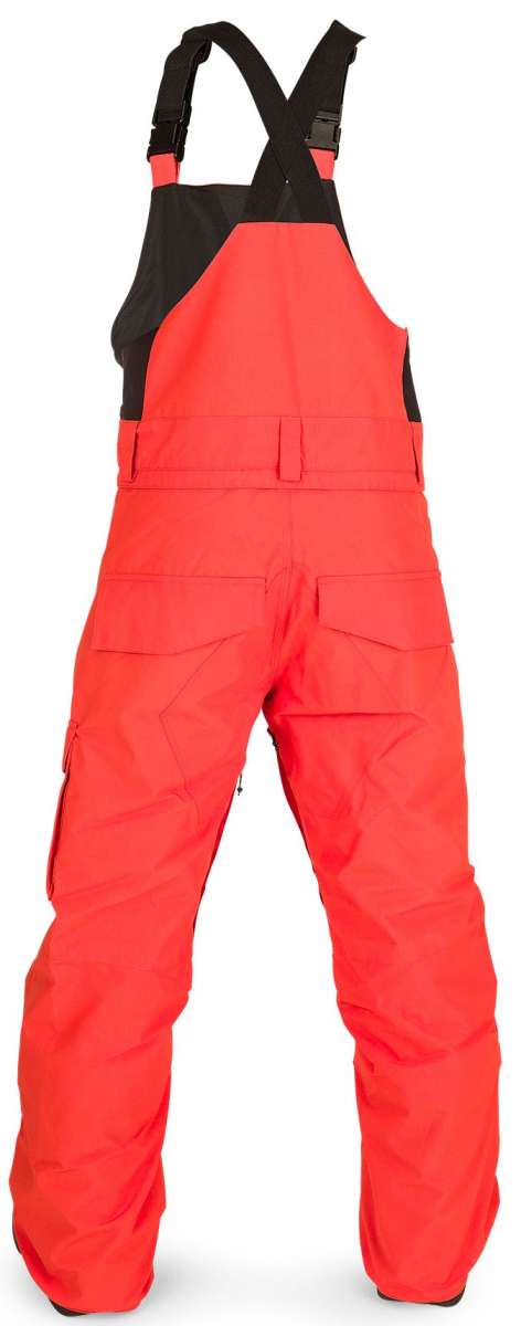 Volcom Juniors Barkley Bib Overall - Black bib overalls with a red and white logo on the left leg, featuring a zippered fly and adjustable straps.