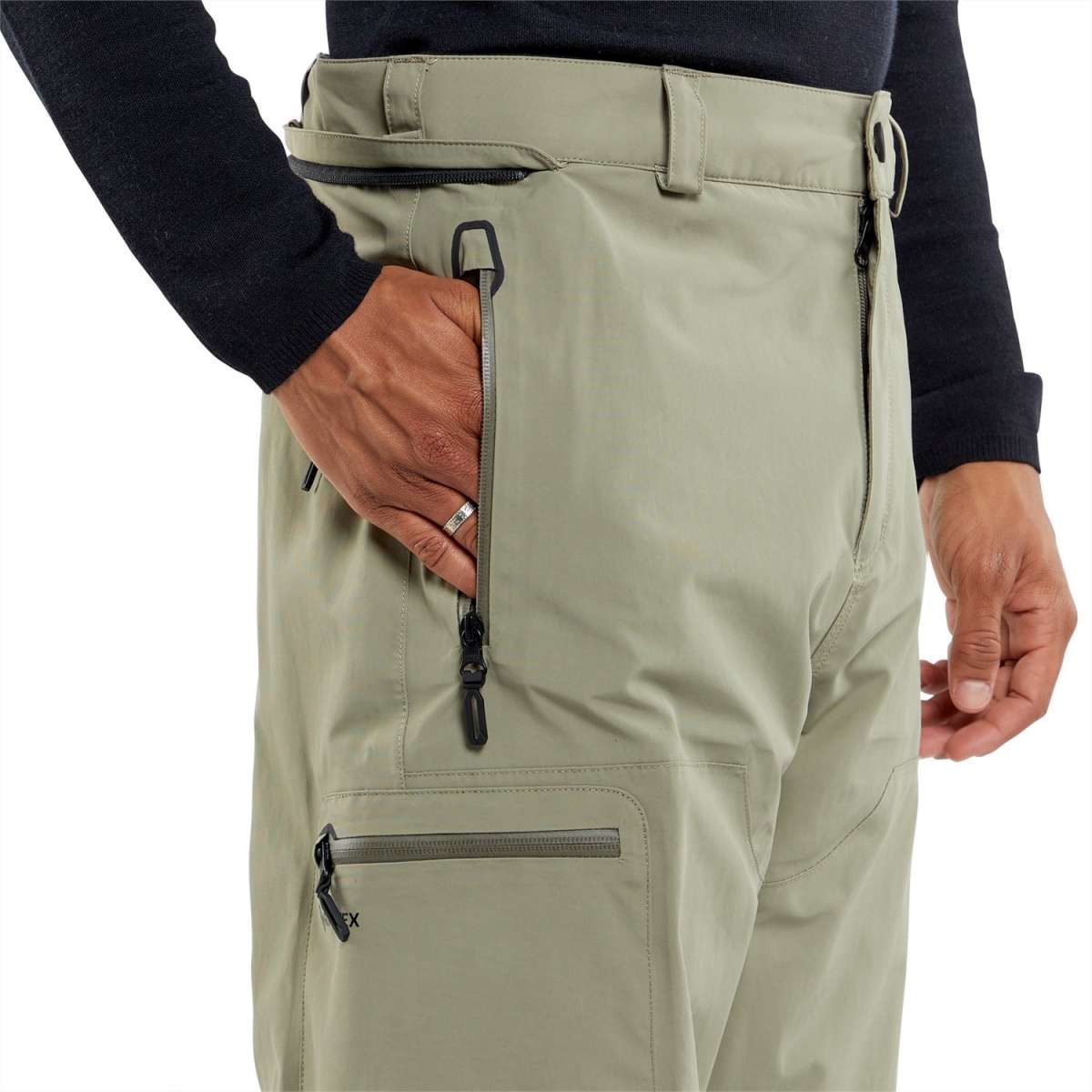 Volcom L GORE-TEX Shell Pant 2024 - A pair of khaki-colored pants with a zippered fly and belt loops.