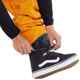 Volcom L GORE-TEX Shell Pant - A pair of yellow snow pants with a black waistband and zipper fly, featuring a white logo on the left thigh.
