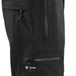 Volcom L GORE-TEX Shell Pant 2024 - Black pants with a zippered pocket on the right thigh and a small white logo near the bottom of the left leg.