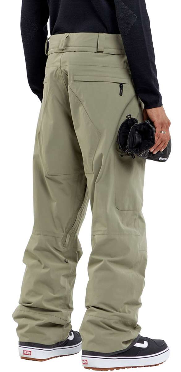 Volcom L GORE-TEX Shell Pant 2024 - A pair of khaki-colored snow pants with a zippered pocket on the right thigh and a black zipper pull.