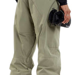 Volcom L GORE-TEX Shell Pant 2024 - A pair of khaki-colored snow pants with a zippered pocket on the right thigh and a black zipper pull.