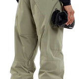 Volcom L GORE-TEX Shell Pant 2024 - A pair of khaki-colored snow pants with a zippered pocket on the right thigh and a black zipper pull.