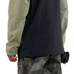 Volcom L Insulated GORE-TEX Jacket 2024 - A green and black jacket with a hood, featuring a white logo on the left chest area.