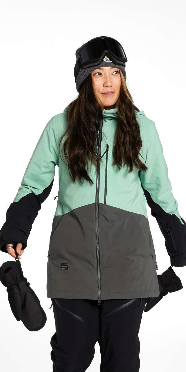 Volcom Women's 3D Stretch GORE-TEX Jacket - A mint green jacket with a black zipper and black trim around the hood.