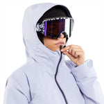 Volcom Women's Ashfield Pullover Jacket - A light blue jacket with a hood, featuring a zipper and two pockets on the front.