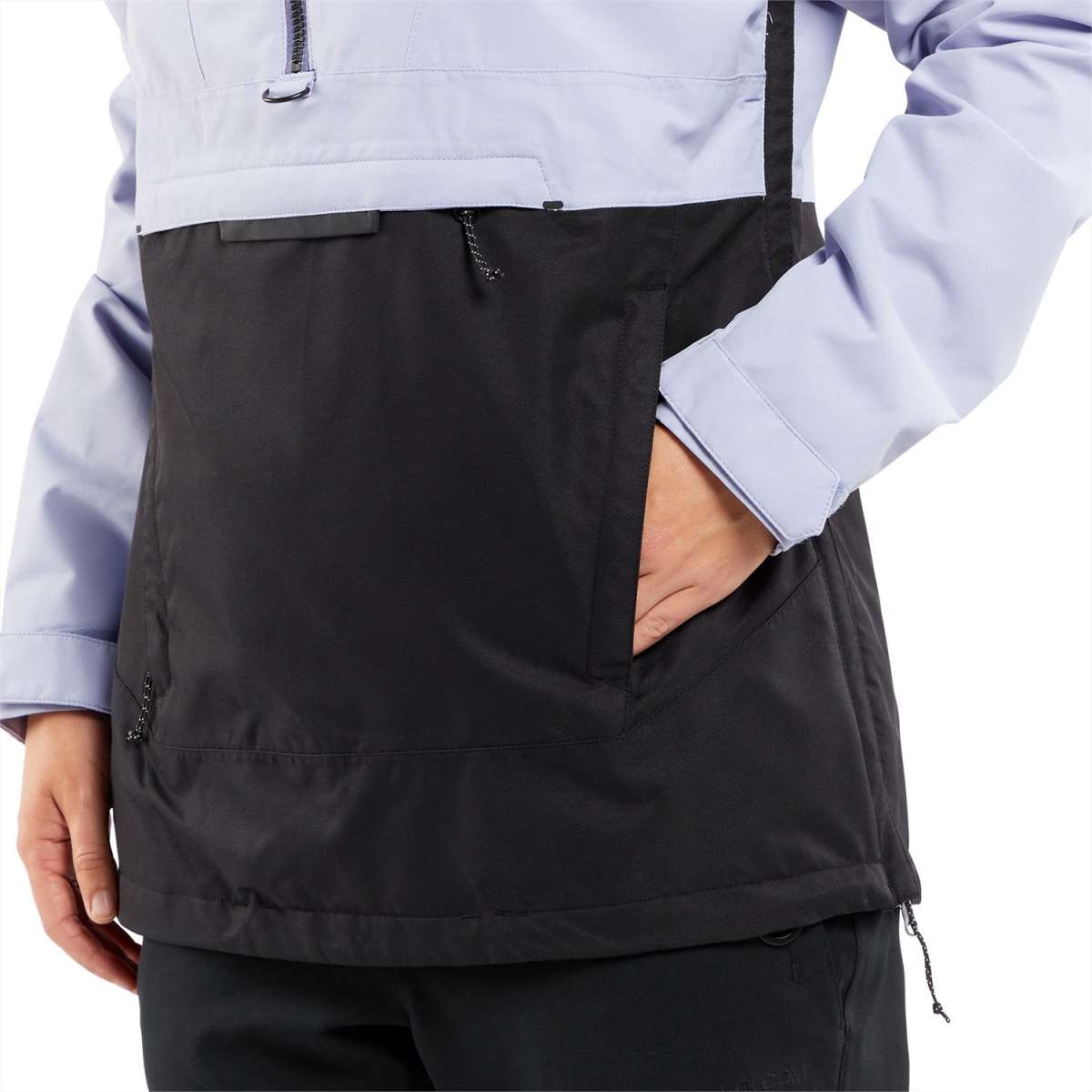 Volcom Women's Ashfield Pullover Jacket - A light blue and black jacket with a zippered chest pocket, worn by a model against a white background.