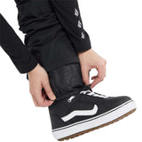 Volcom Women's Battle Stretch High Rise Pants 2024 - Black pants with a subtle leopard pattern on the upper thigh area.