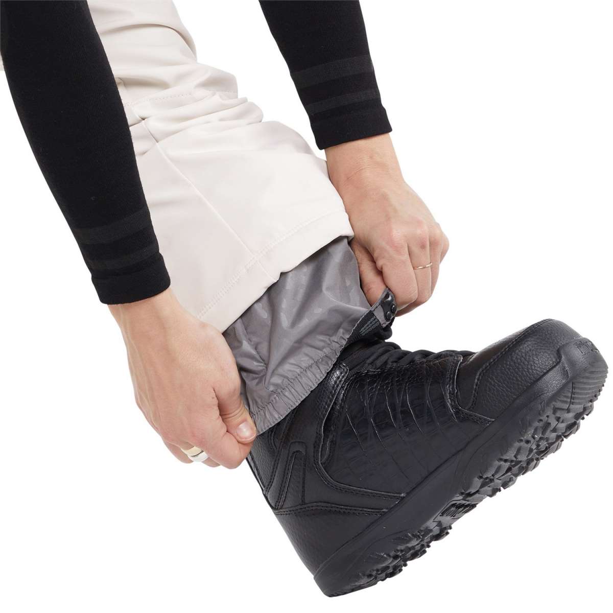 Volcom Women's Battle Stretch High Rise Pants 2024 - Pair of women's snowboard pants with a high rise and stretch material, featuring a subtle pattern on the fabric.