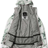 Volcom Women's Bolt Insulated Jacket 2024 - A white and green abstract patterned jacket with a hood, laid flat on a solid background.