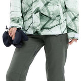 Volcom Women's Bolt Insulated Jacket - A white jacket with a green geometric pattern and a hood, worn by a model with blonde hair in braids.