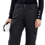 Volcom Women's Bridger Insulated Pant - Black snow pants with white logo on left leg cuff and zippered pocket at right thigh.