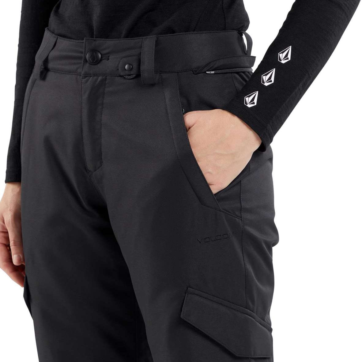 Volcom Women's Bridger Insulated Pant 2024 - Black snow pants with a zippered pocket on the side and adjustable Velcro straps at the waist.