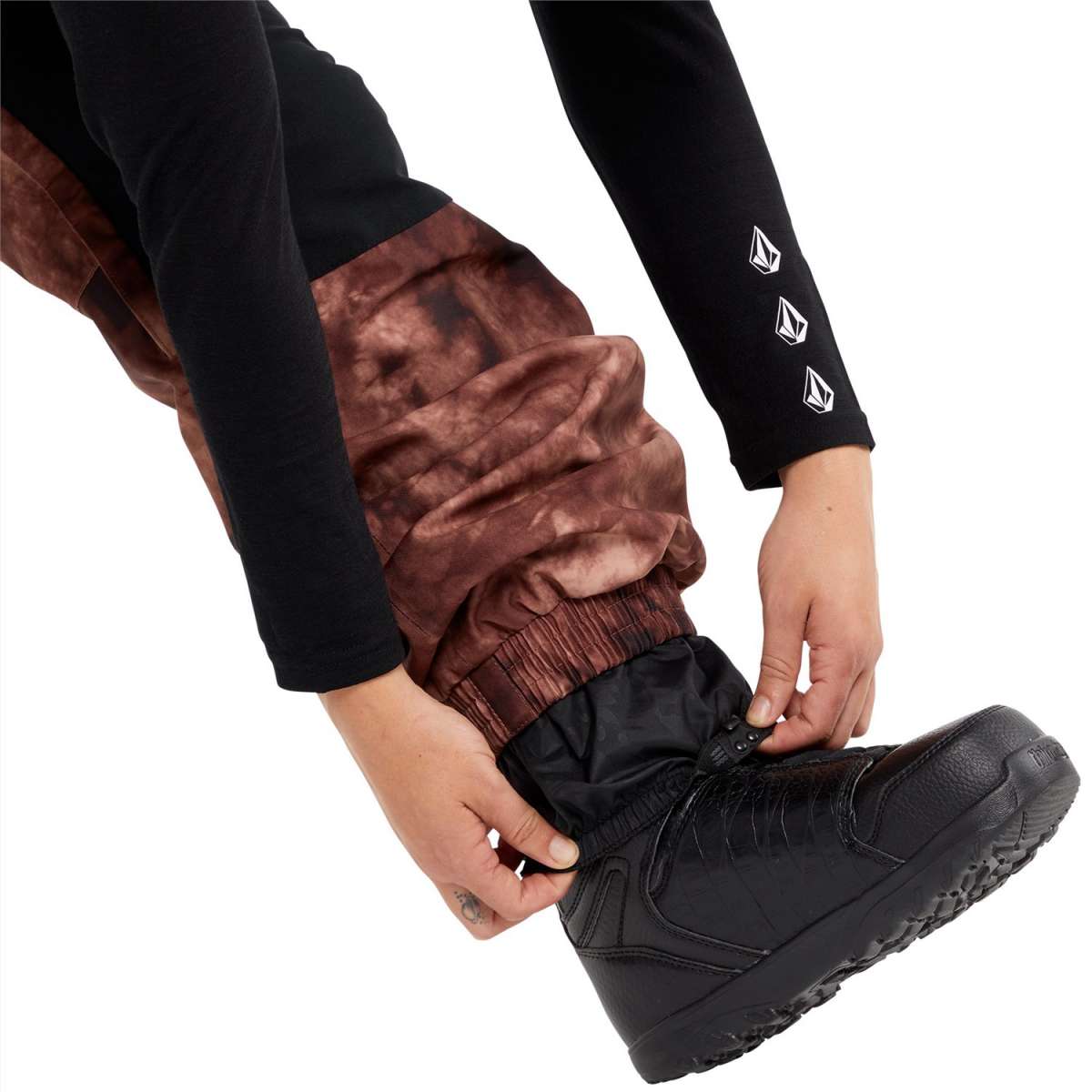 Volcom Women's Creston 3D Stretch Bib Pant 2024 - Black bib pant with a subtle pattern of thin, darker lines on the upper thigh area.