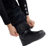 Volcom Women's Creston 3D Stretch Bib Pant 2024 - Black bib pant with white logo on left thigh and elastic waistband.