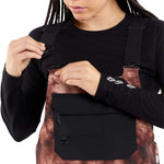 Volcom Women's Creston 3D Stretch Bib Pant - Black bib pant with a subtle white pattern on the side of the leg.