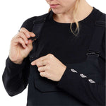 Volcom Women's Creston 3D Stretch Bib Pant - Black bib pants with white logo on left leg and adjustable straps.