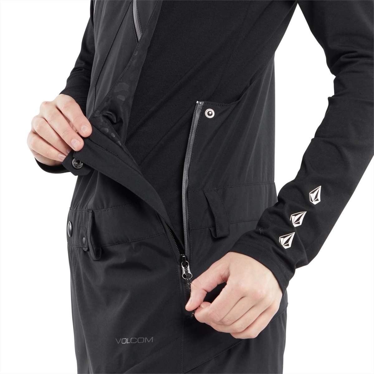 Volcom Women's Elm Stretch GORE-TEX Bib Pant 2024 - Black bib pant with diagonal white logo on left thigh and black stretch fabric.