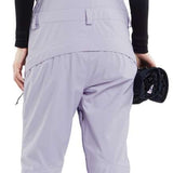 Volcom Women's Elm Stretch GORE-TEX Bib Pant - Black bib with white logo on left thigh and black straps over shoulders.