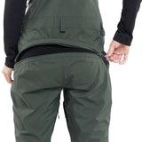Volcom Women's Elm Stretch GORE-TEX Bib Pant 2024 - Dark green bib pant with black zippers and adjustable cuffs.