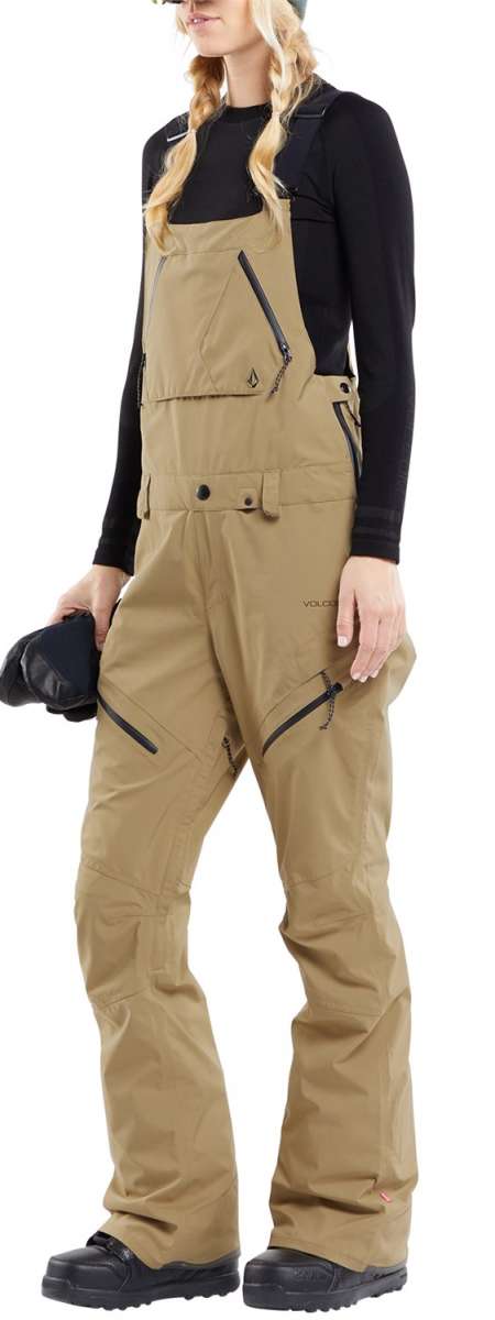 Volcom Women's Elm Stretch GORE-TEX Bib Pant - Black bib pant with black stretch fabric and silver zipper on right thigh.
