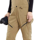 Volcom Women's Elm Stretch GORE-TEX Bib Pant - Black bib pant with black stretch fabric and silver zipper on right thigh.