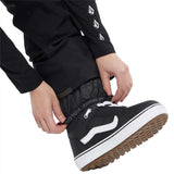 Volcom Women's Elm Stretch GORE-TEX Bib Pant - Black bib pant with white logo on left thigh and black stretch fabric.