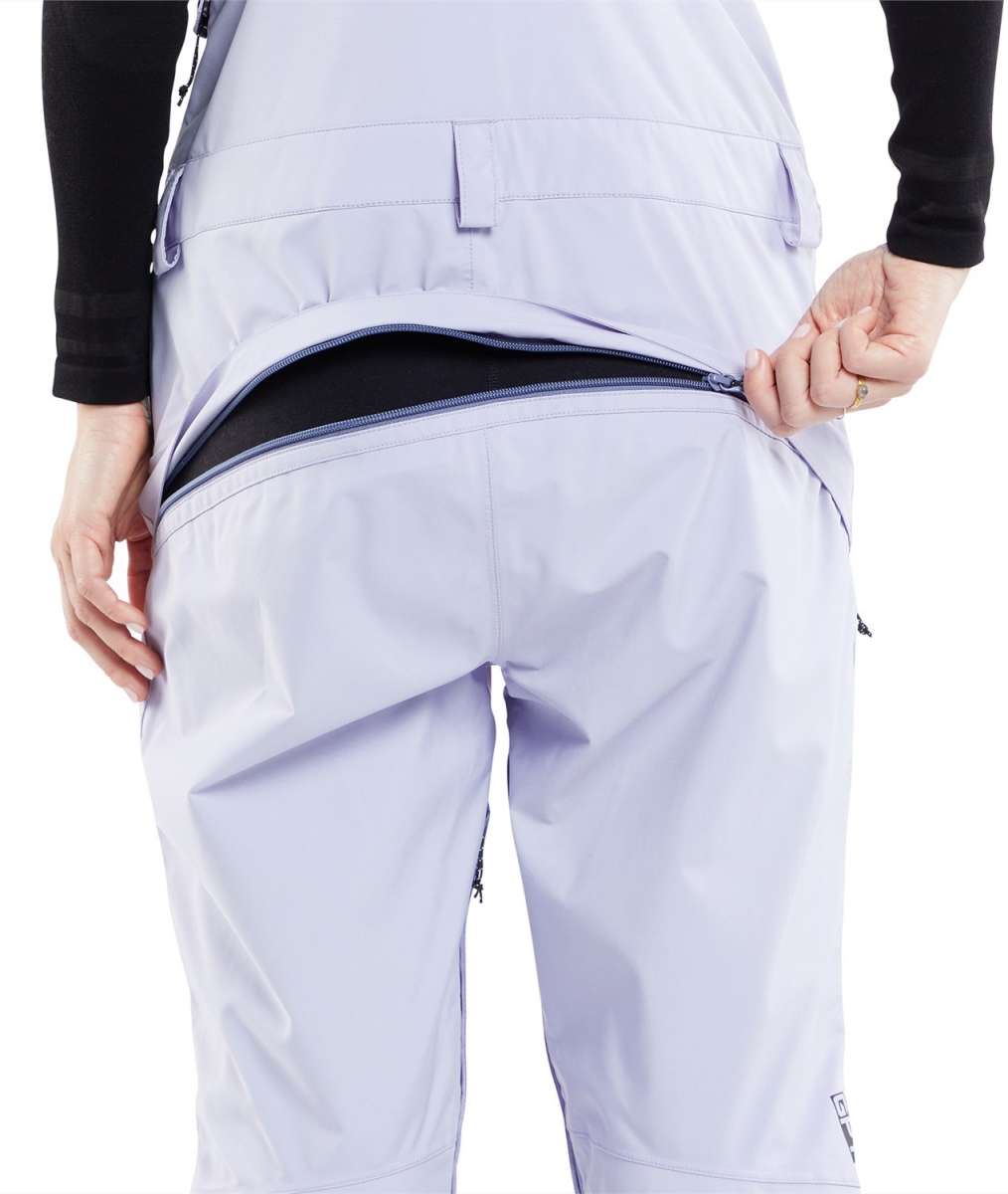 Volcom Women's Elm Stretch GORE-TEX Bib Pant - Black bib pant with white logo on left thigh and black stretch material at waistband.