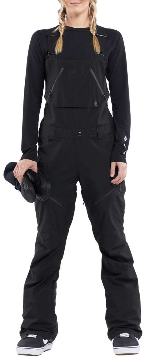 Volcom Women's Elm Stretch GORE-TEX Bib Pant - Black bib pant with white logo on left leg and black straps over shoulders.