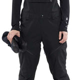 Volcom Women's Elm Stretch GORE-TEX Bib Pant - Black bib pant with white logo on left leg and black straps over shoulders.