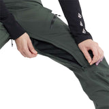 Volcom Women's Elm Stretch GORE-TEX Bib Pant 2024 - Dark green bib pant with black zipper and white logo on left thigh.