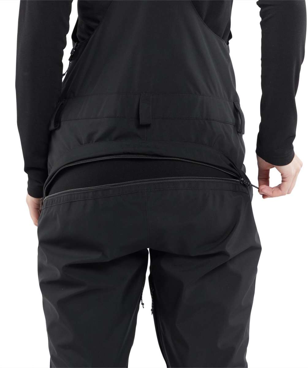 Volcom Women's Elm Stretch GORE-TEX Bib Pant 2024 - Black bib pant with a stretchy material and GORE-TEX logo on the left leg.