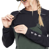 Volcom Women's Elm Stretch GORE-TEX Bib Pant - A pair of dark green snow pants with a black logo on the left thigh and adjustable straps at the shoulders.