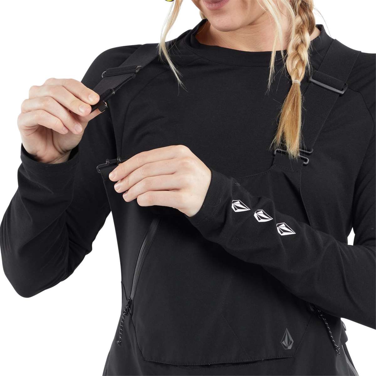 Volcom Women's Elm Stretch GORE-TEX Bib Pant - Black bib pant with white logo on left thigh and black stretch material.