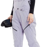 Volcom Women's Elm Stretch GORE-TEX Bib Pant - Light gray bib pant with black zippers and straps, featuring a stretchy material.