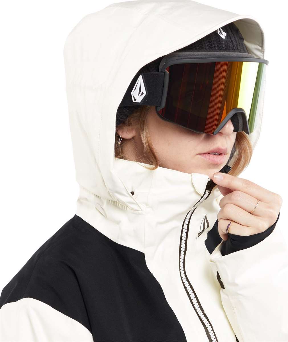 Volcom Women's Fern Insulated GORE-TEX Pullover 2024 - A black and white insulated ski jacket with a hood, featuring a zipper closure and two zippered pockets on the front.