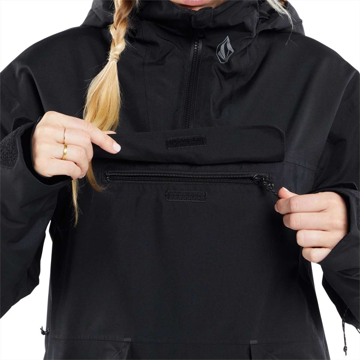 Volcom Women's Fern Insulated GORE-TEX Pullover 2024 - A black insulated pullover with a hood and zippered chest pocket, featuring a small gray logo on the left side of the chest.